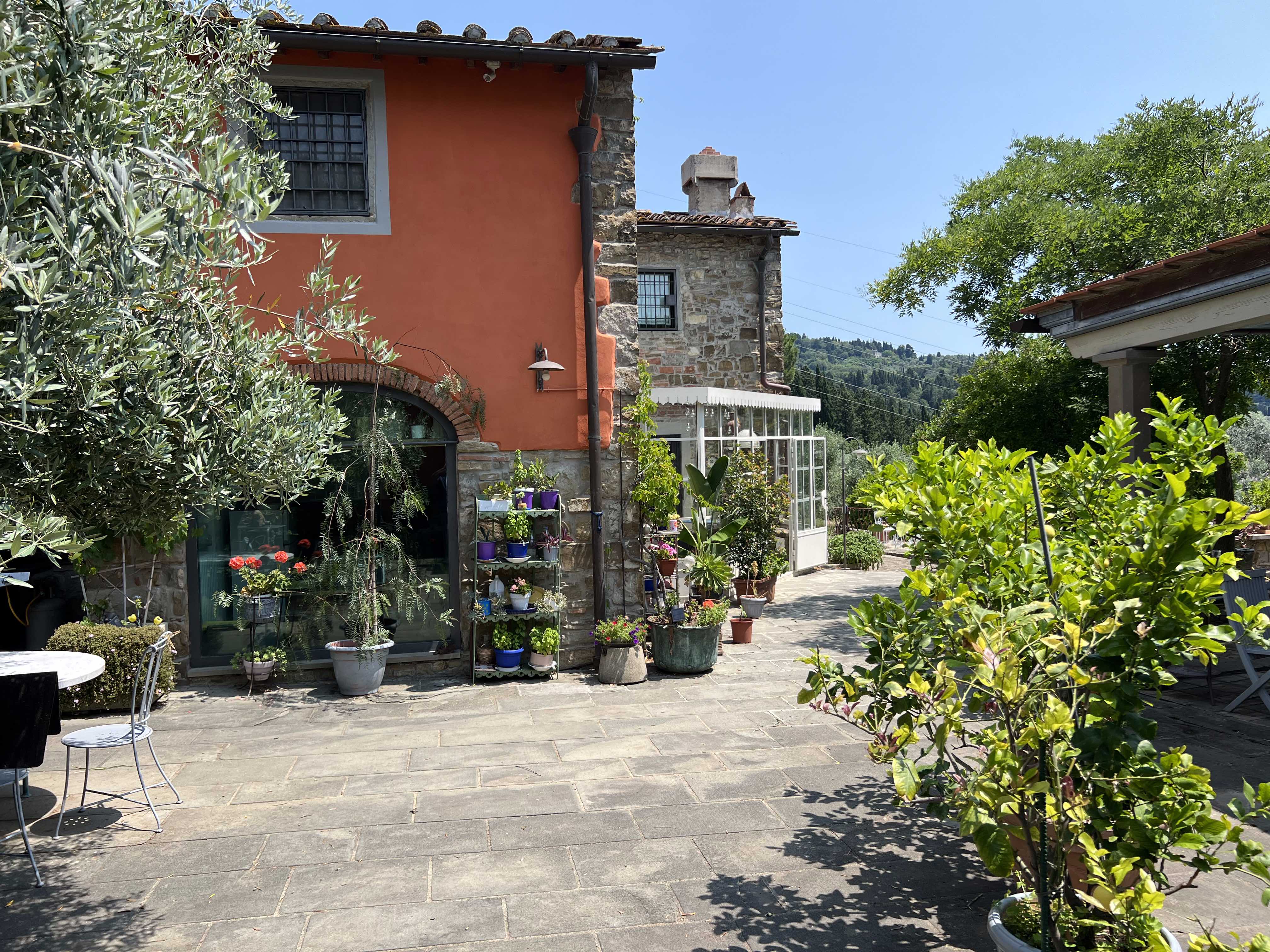 Terracotta villa with lush Mediterranean gardens